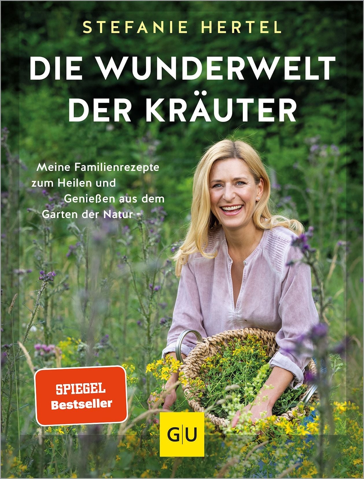 ZU nsehen ist das Cobver des Buches von Stefanie Hertel, das sie auf einer Kräuterwiese zeigt.