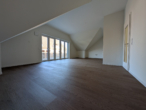 Wohnzimmer mit Balkon - Neubau in traumhafter Lage in Mühl Rosin